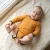 Glueckskind_merinowolle_Seide_body_sonnengelb.webp