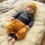 Glueckskind_wickelbody_fels_merinowolle_Seide2.webp