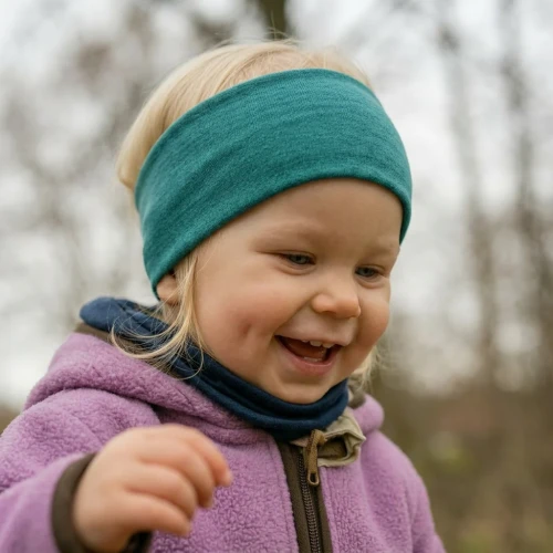 heywool_glueckskind_stirnband_smaragd_0fc96711-5eac-49c6-bbd9-b7507f5ab175.webp