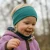 heywool_glueckskind_stirnband_smaragd_0fc96711-5eac-49c6-bbd9-b7507f5ab175.webp