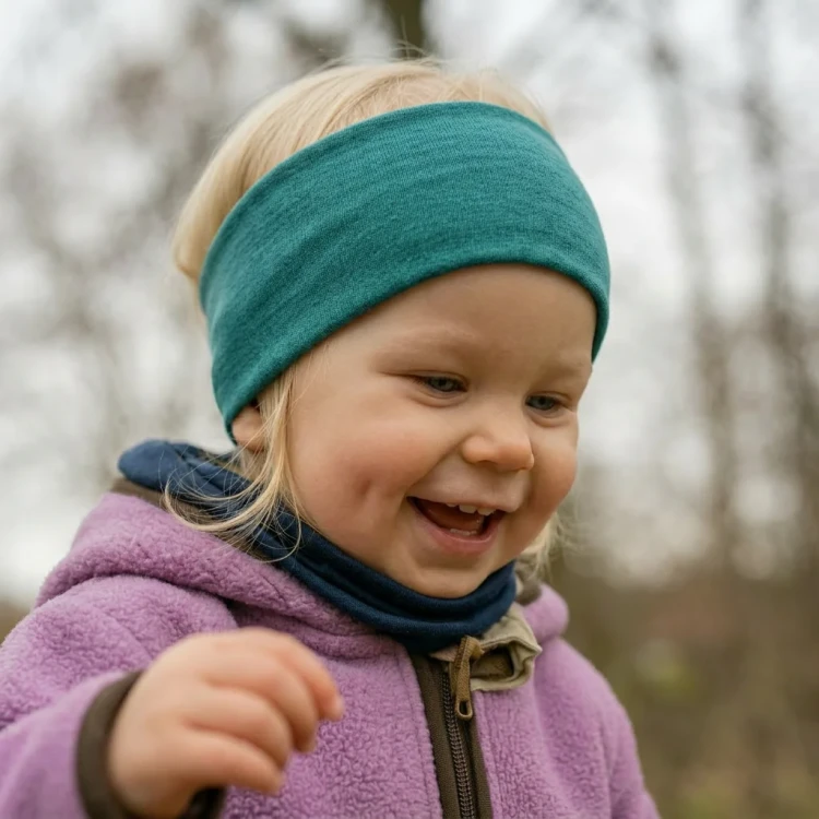 heywool_glueckskind_stirnband_smaragd_0fc96711-5eac-49c6-bbd9-b7507f5ab175.webp