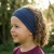 Glueckskind_stirnband_merinowolle_Seide_royalblau_kind.webp